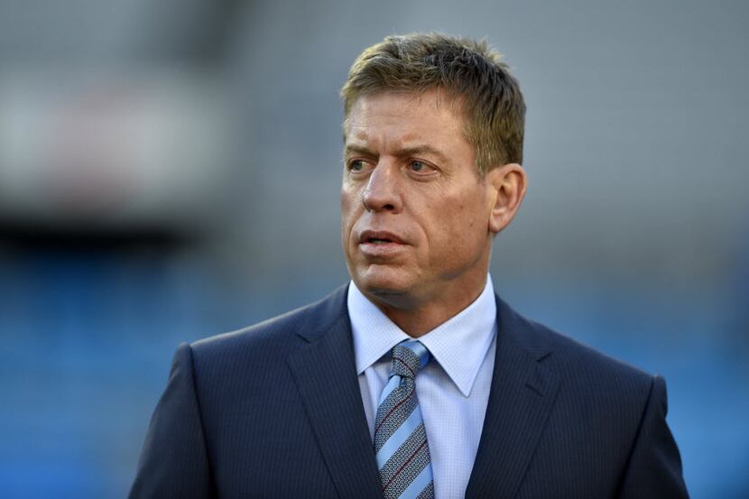 Jan 24, 2016; Charlotte, NC, USA; Fox Sports analyst Troy Aikman on the field before the...