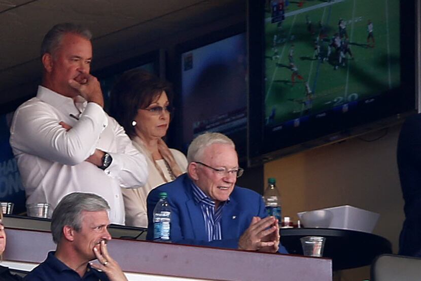 Dallas Cowboys owner Jerry Jones (right),  his son Stephen Jones (left) and wife Gene Jones...