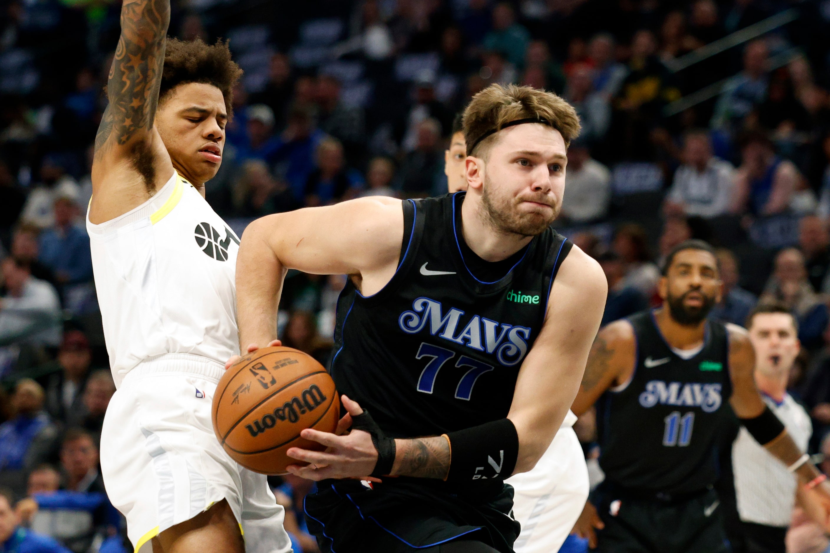 Dallas Mavericks guard Luka Doncic (77) drives past Utah Jazz guard Keyonte George (3)...