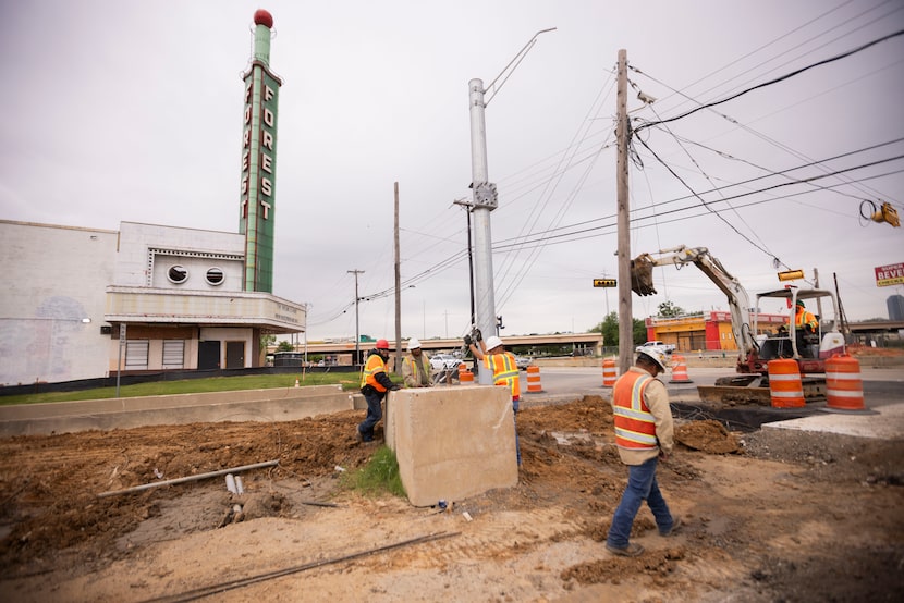 Outside the Forest Theater, the state transportation department leads a project to convert...