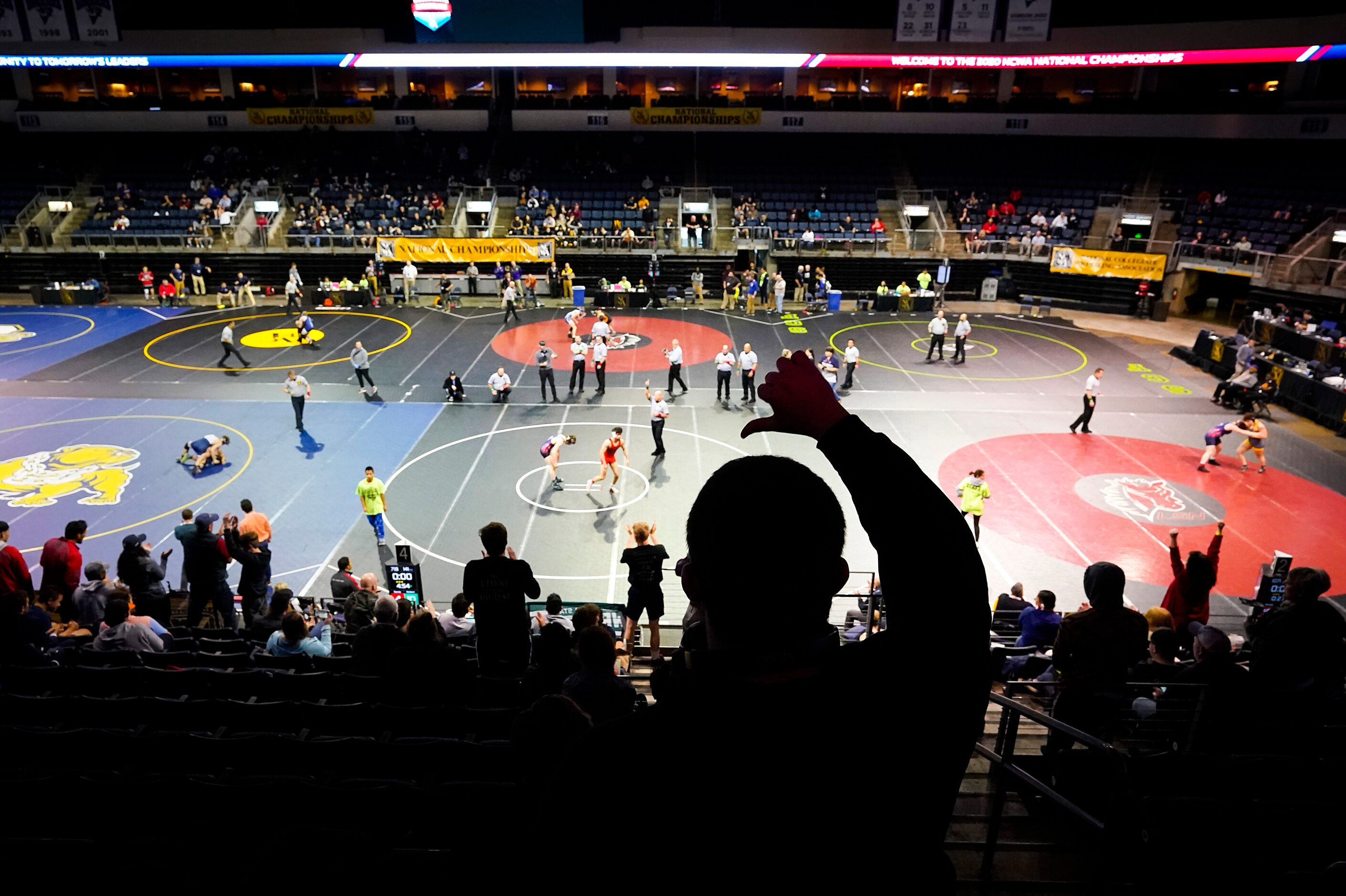 A fan gives a thumbs down to a refereeÕs decision during the NCWA national championships at...