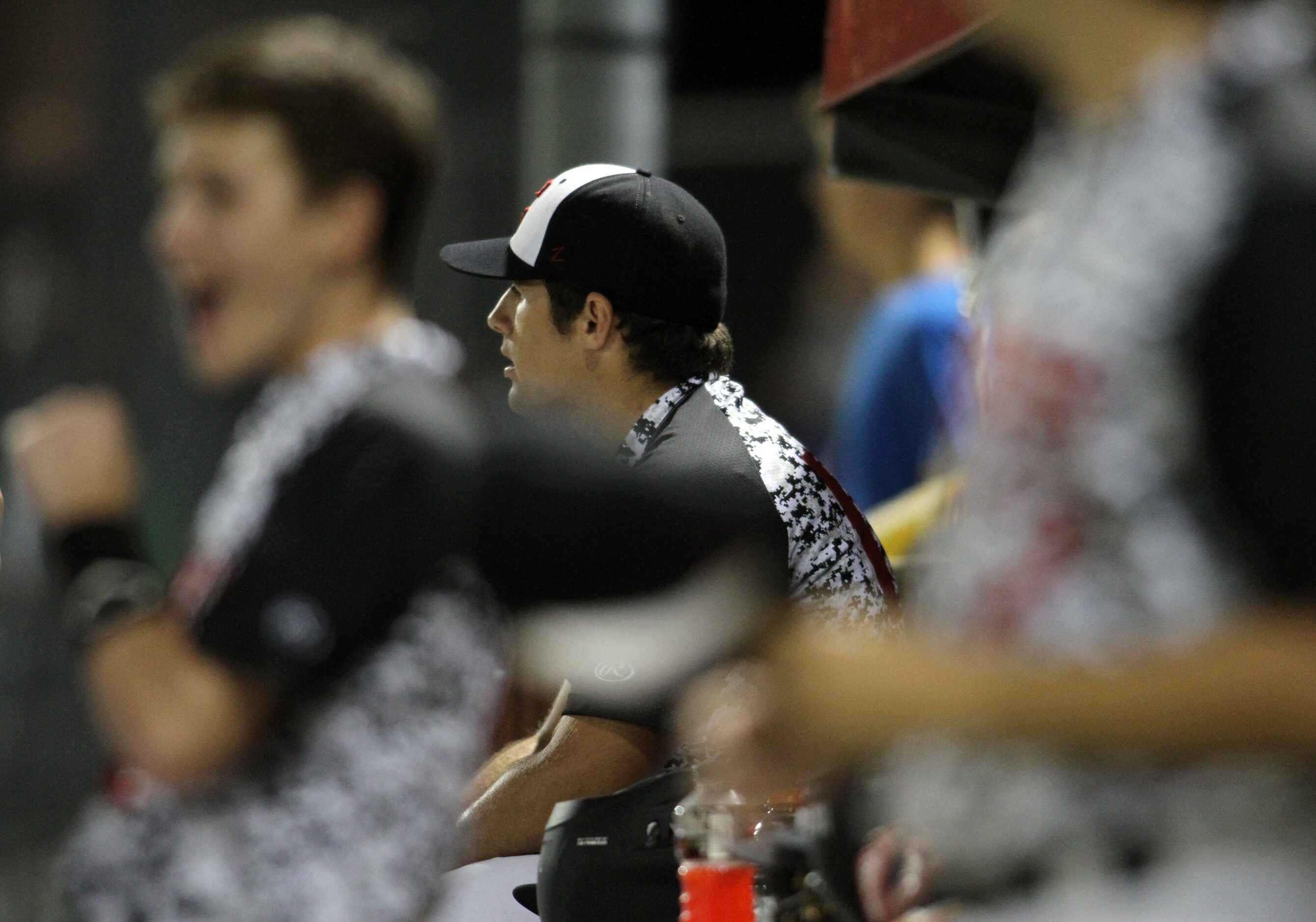 Even from the team bench during a brief break between pitching, Carrollton Creekview pitcher...