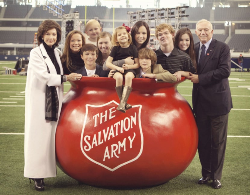 Cowboys owner Jerry Jones and wife Gene pose with their nine grandchildren (from left):...