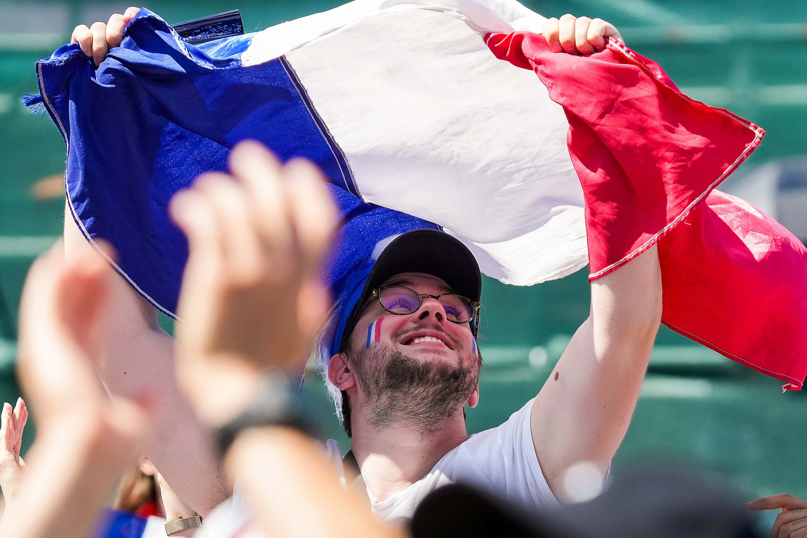 Fans cheer Bassa Mawem of France as he climbs against Yaroslav Tkach of Ukraine during men’s...