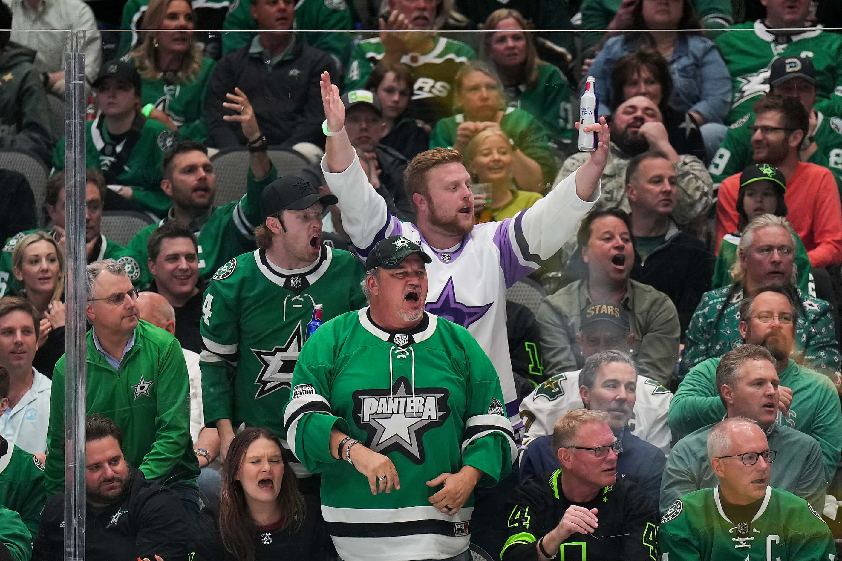 Dallas Stars fans react to a call during the second period in Game 5 of an NHL hockey...