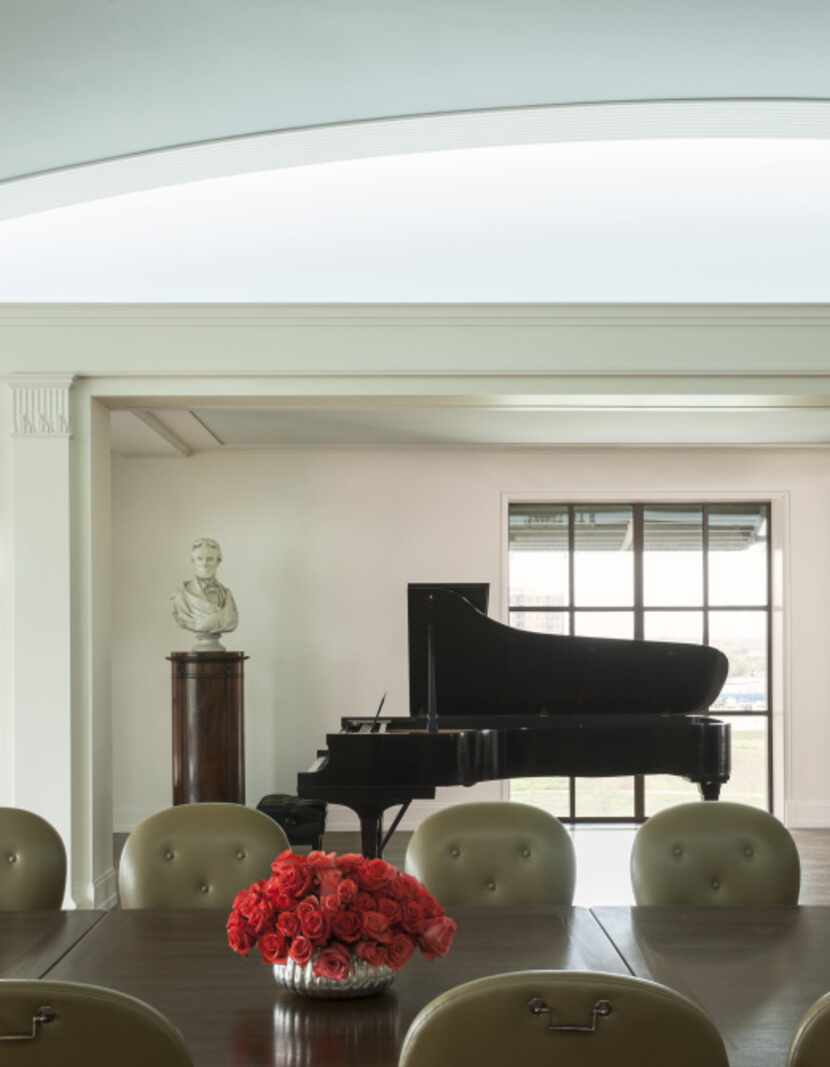 In a private reception area next to the dining room is one of Van Cliburn's personal black...