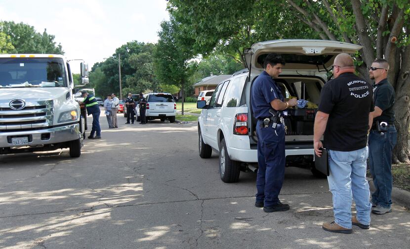 Dallas and Murphy police investigated a possible suicide in northeast Dallas on Saturday. 