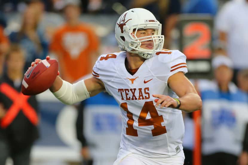 PROVO, UT - SEPTEMBER 7: David Ash #14 of the Texas Longhorns looks to throw the ball during...