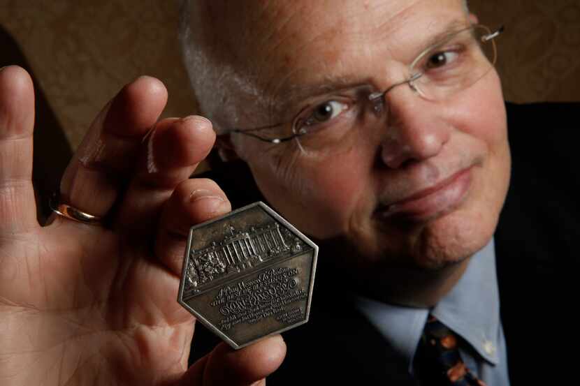 Hervey Priddy with a special edition Ronald Reagan presidential inauguration medal. (Nathan...
