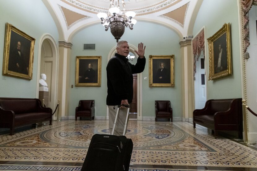 WASHINGTON, DC - DECEMBER 22: Rep. Pete Sessions (R-TX) waves to reporters as he departs the...