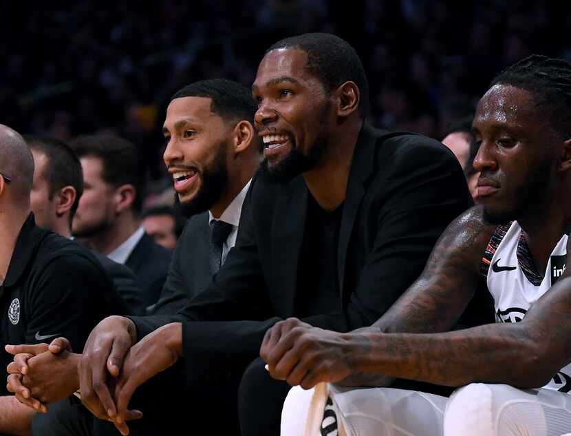 Kevin Durant of the Brooklyn Nets smiles during the first half against the Los Angeles...