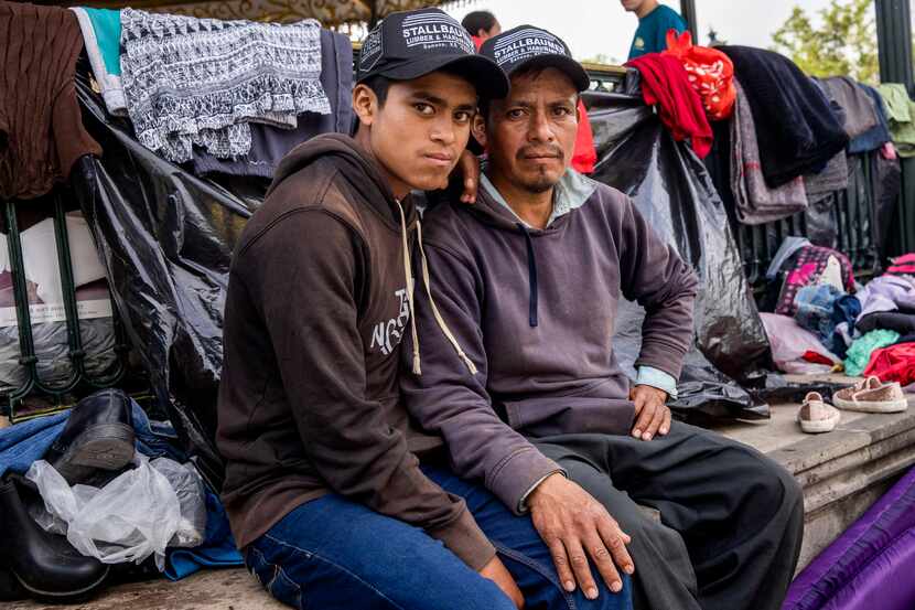 Guatemalan migrant Antulio Bamaca, right, and his 16-year-old son Everardo pose for a...