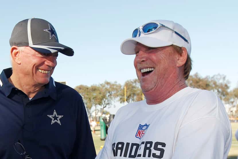 Dallas Cowboys owner Jerry Jones greets Oakland Raider owner Mark Davis (right) during their...