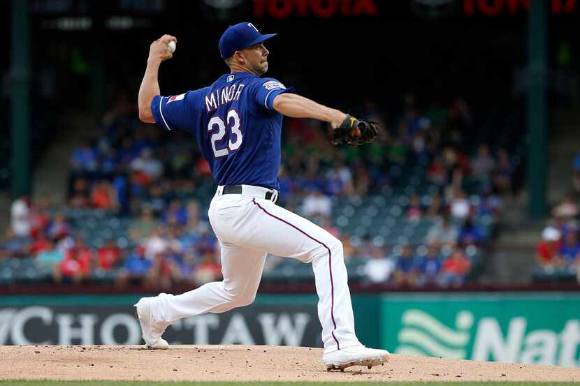 ARLINGTON, TX - JUNE 5: Mike Minor #23 of the Texas Rangers throws against the Baltimore...