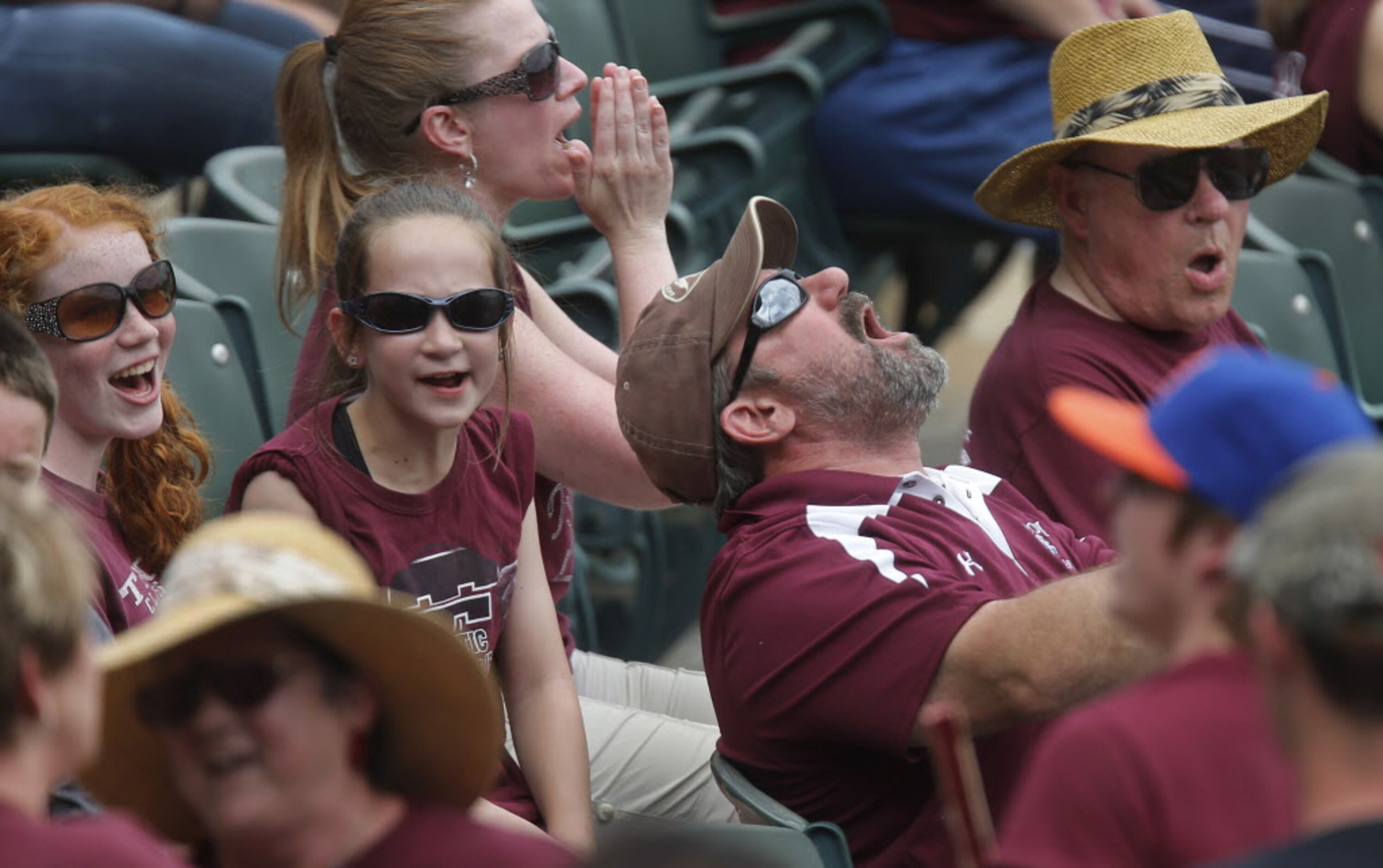 Troy Trojans fans try to help rally this team in the fourth inning during the Troy High...