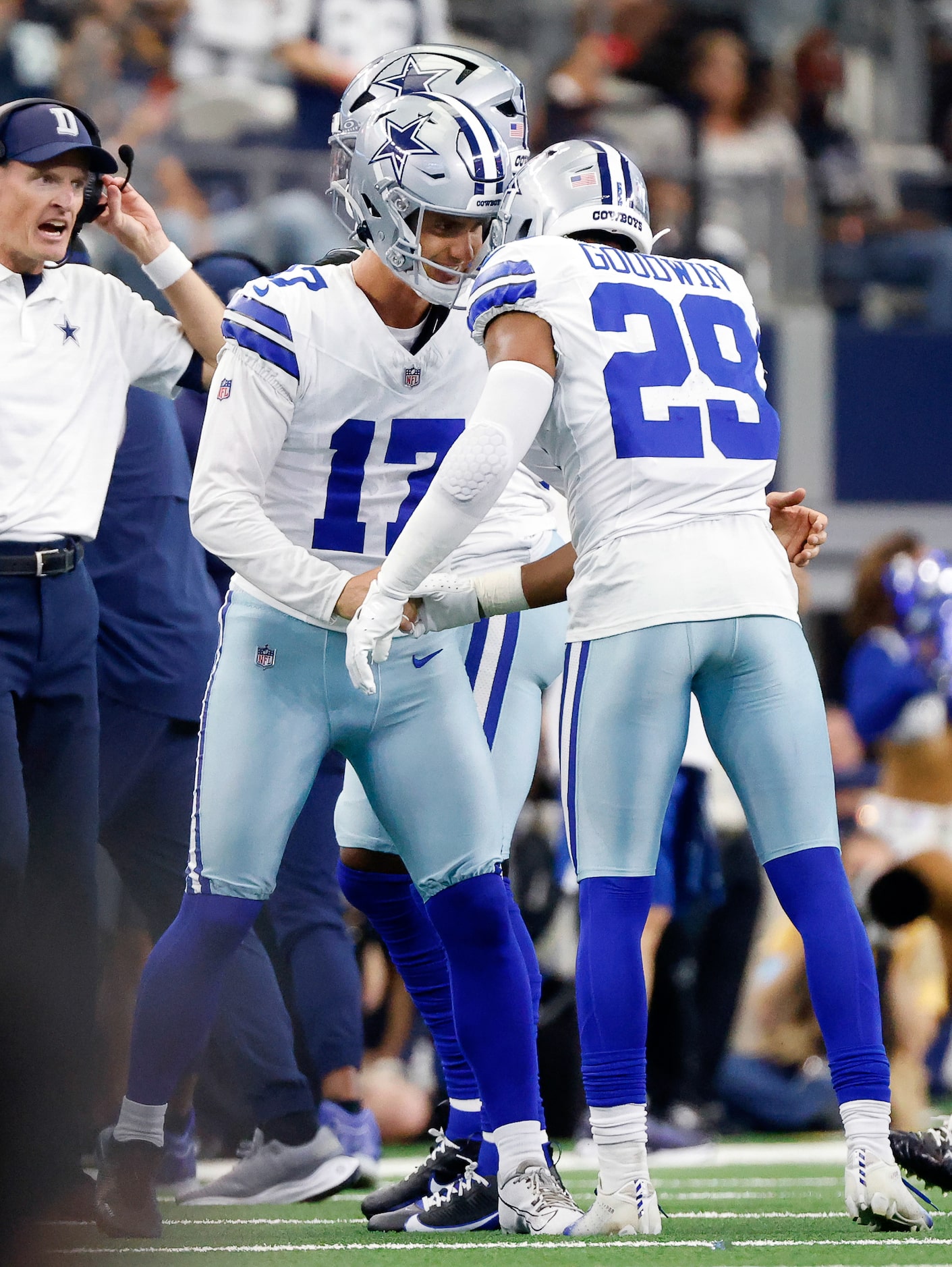 Dallas Cowboys cornerback C.J. Goodwin (29) congratulates place kicker Brandon Aubrey (17)...