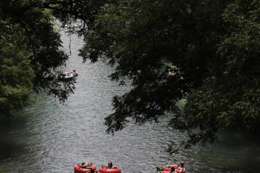 Tubers float on the Comal River July 1, 2015, in New Braunfels. 