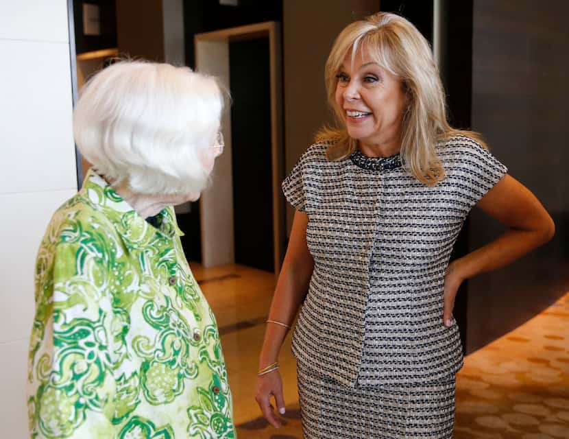 Madeline McClure (right) talked with Ginny Whitehill at the Dallas Women's Foundation...