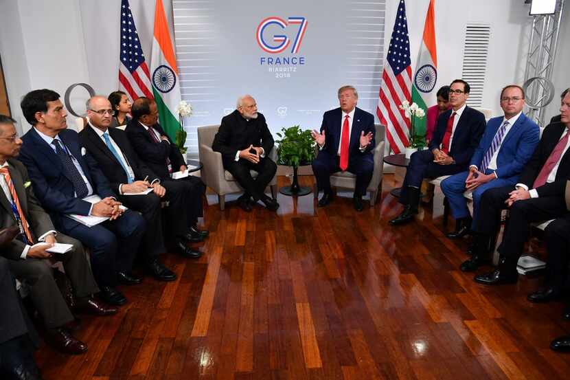 Indian Prime Minister Narendra Modi and President Donald Trump speak during a bilateral...