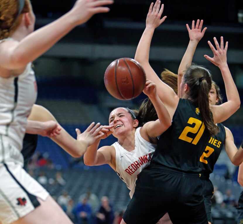 Mara Casey drives by Amarillosâ Ashlyn Milton. UIL girls basketball 5A State final between...