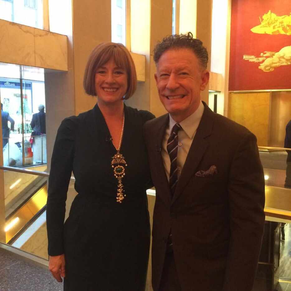 Neiman Marcus vice president Ginger Reeder with Lyle Lovett posing at an event for the 2015...