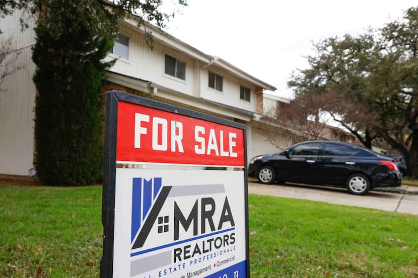 A “for sale” sign is displayed outside of a house in Carrollton. D-FW home prices were up...