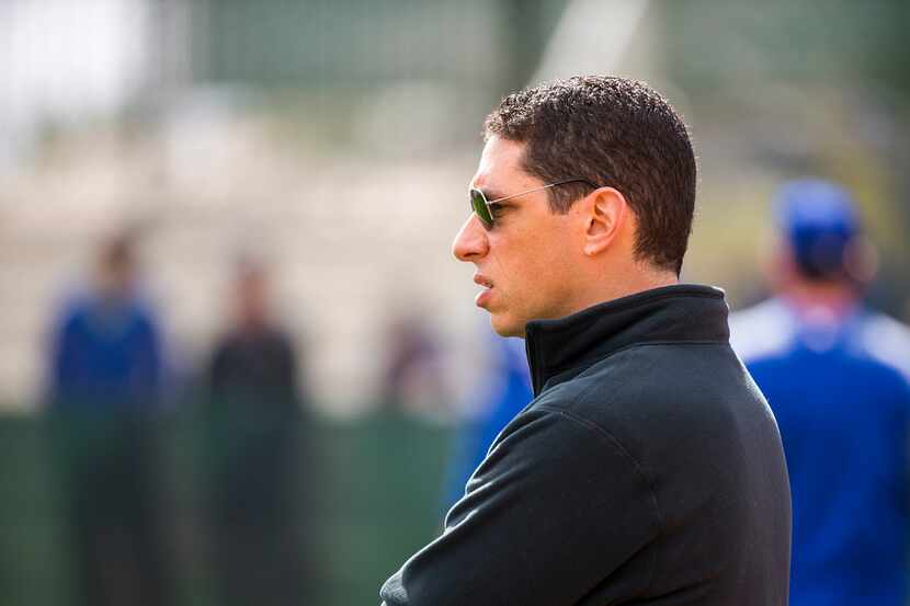 FILE - Rangers general manager Jon Daniels watches players during a spring training workout...