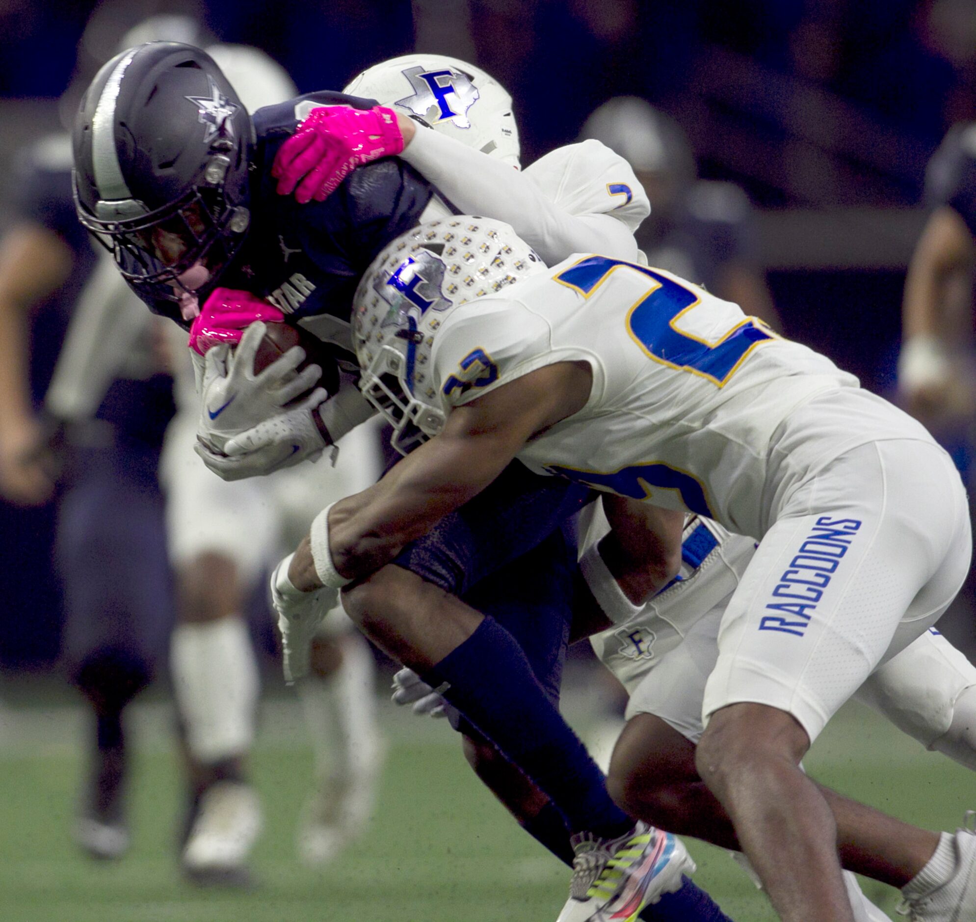 Frisco Lone Star's Davian Groce (0) is stopped just short of the goalie by Frisco defenders...