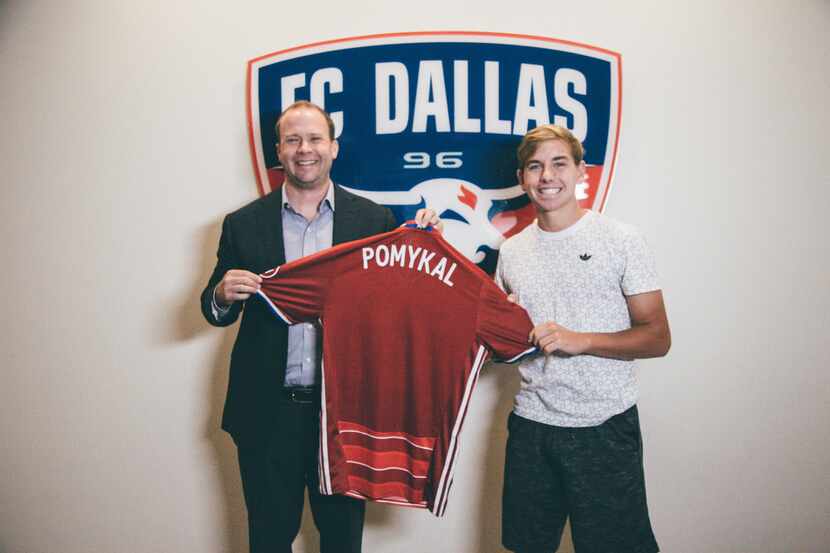 FC Dallas president Dan Hunt, left, is pictured with newest signing Paxton Pomykal, the...