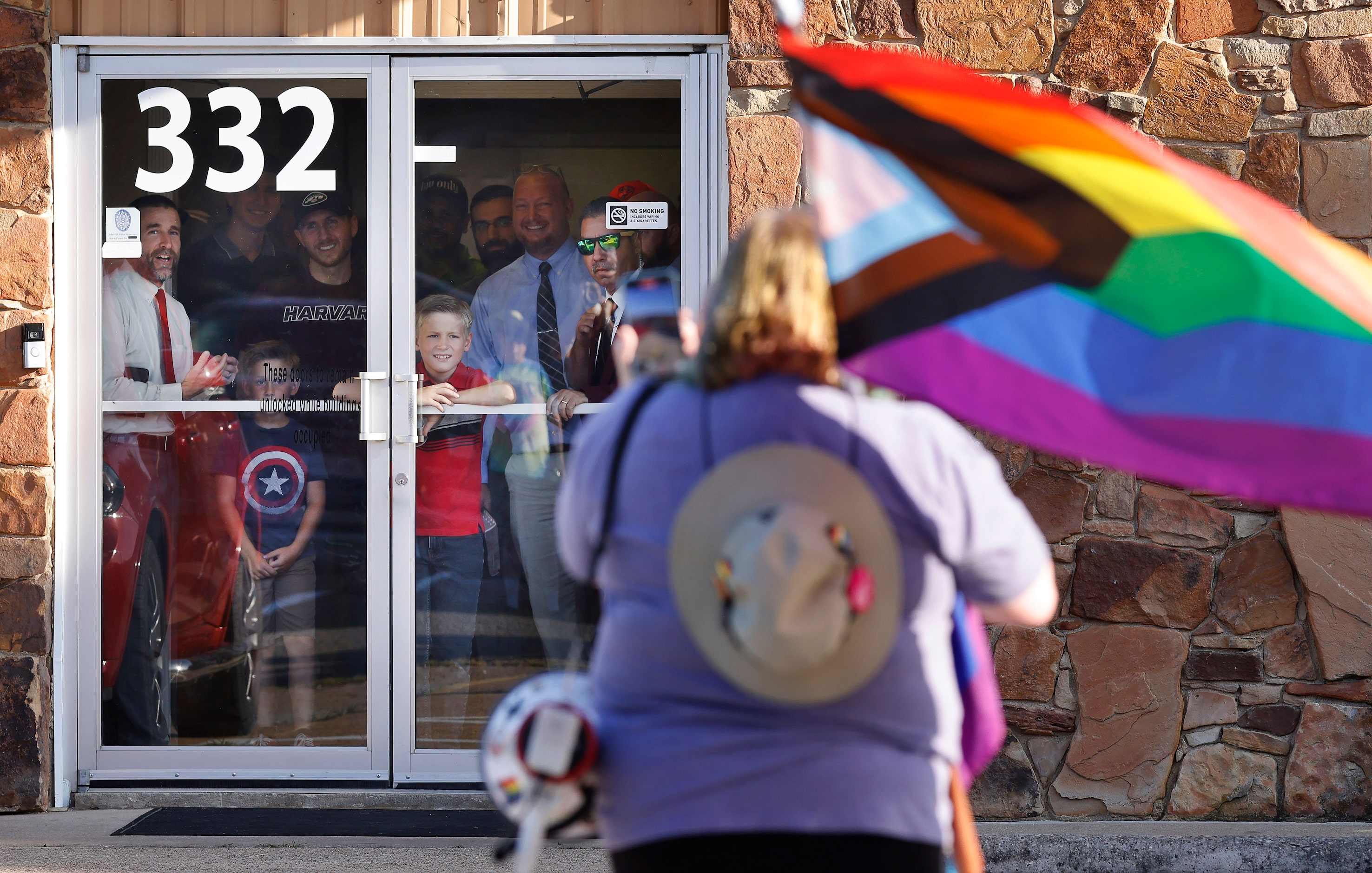 New Independent Fundamentalist Baptist founder Steven Anderson (left) and his followers...