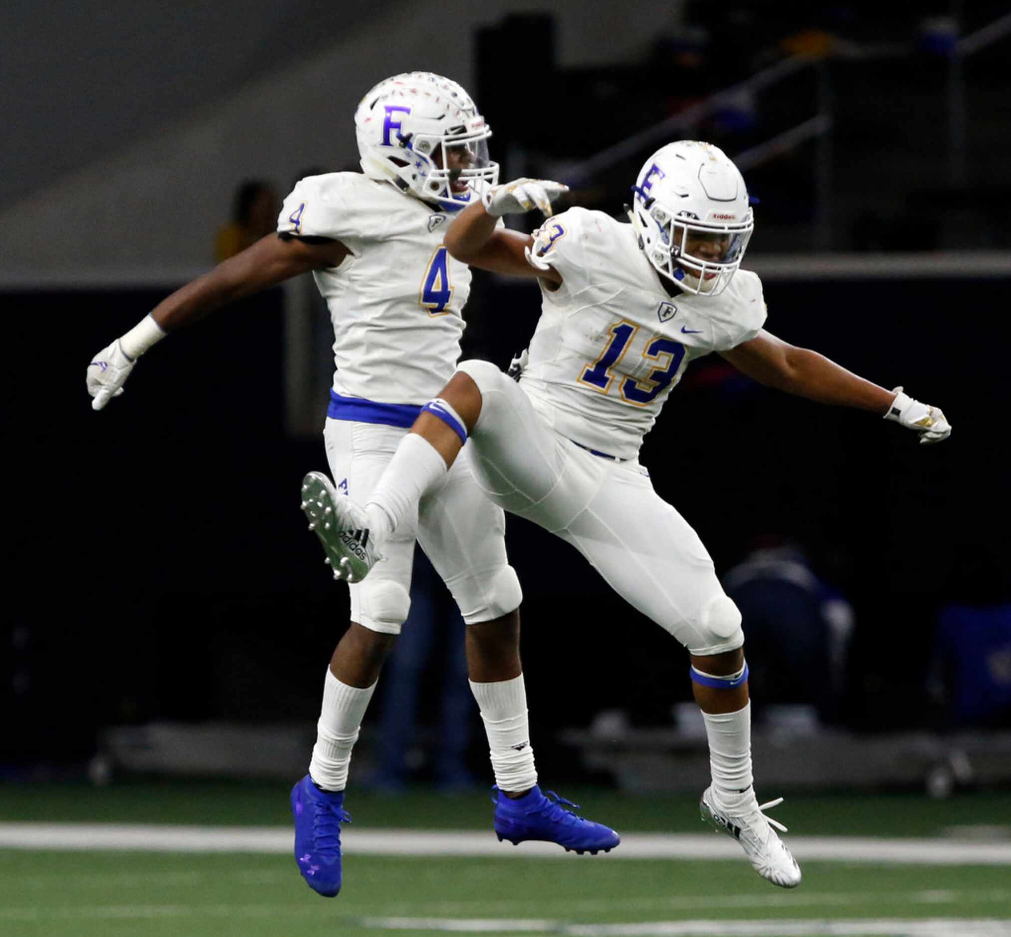 Frisco defender Chase Lowery (4) and teammate Blake May (13) celebrate Lowery's interception...