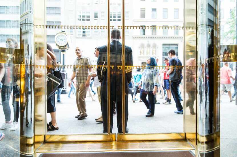 A guard outside the lobby at Trump Tower, on Fifth Avenue in Manhattan, July 9, 2016. 