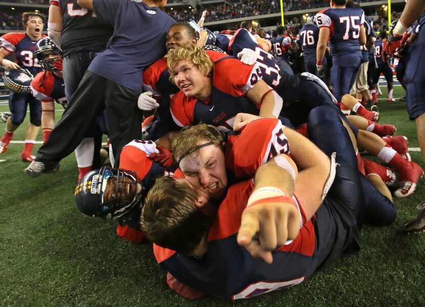 Allen defensive lineman Stone Drulman (45) celebrates with teammates at the end of the game...