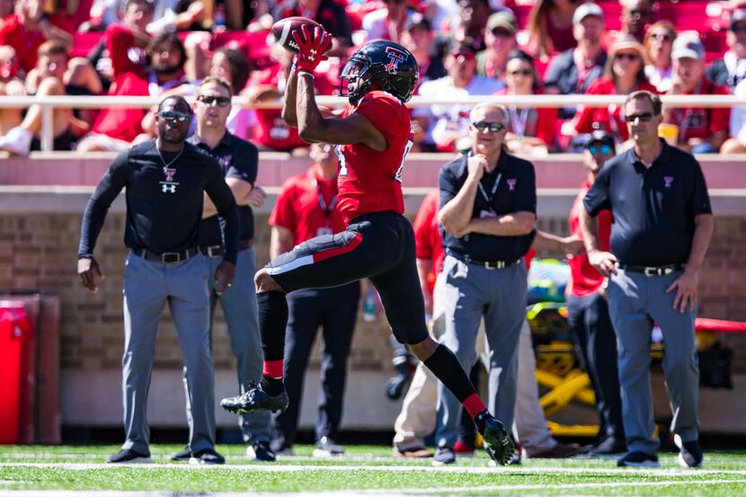 FILE - Texas Tech wide receiver Erik Ezukanma catches a pass during the second half of a...