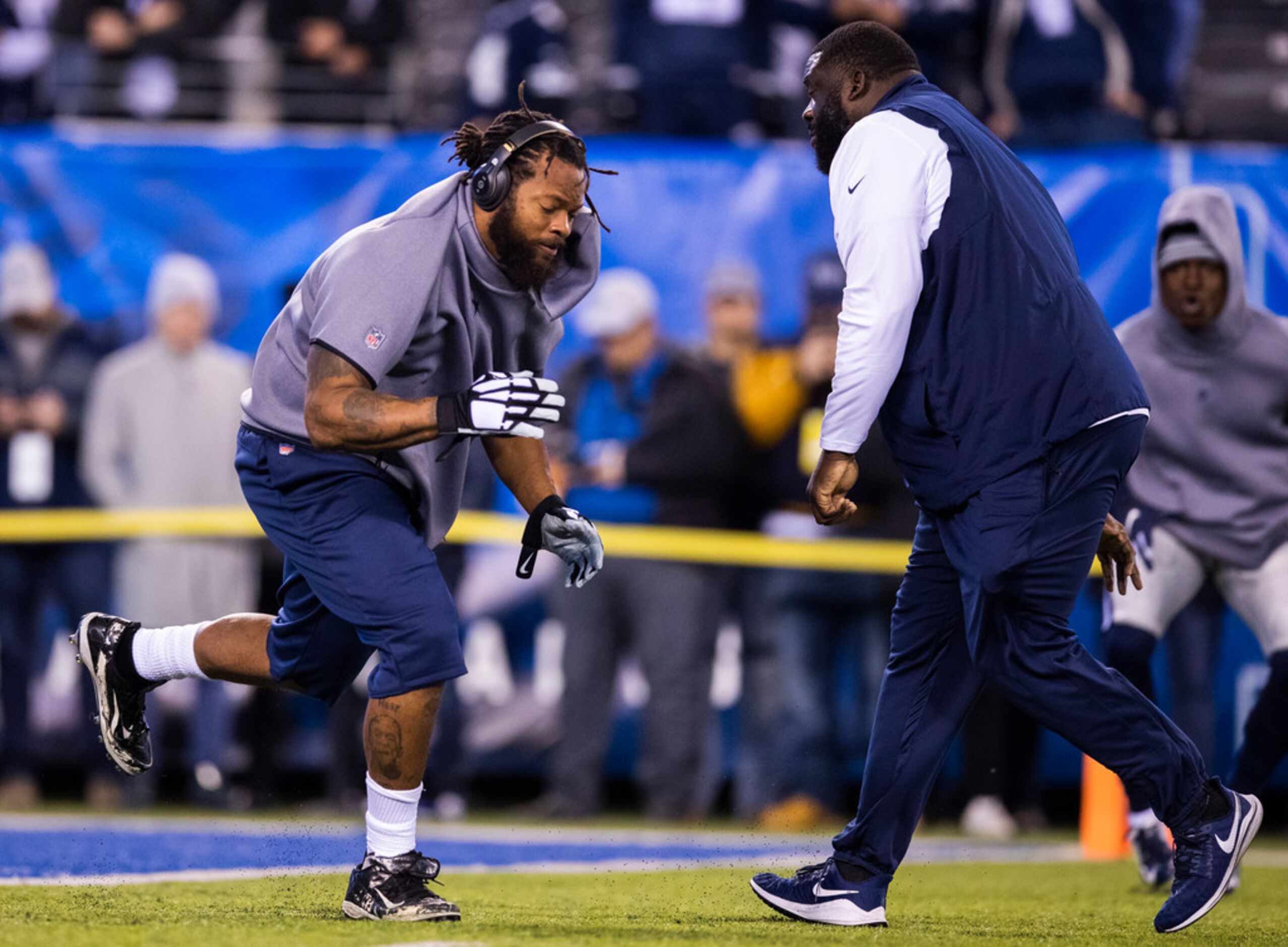 Dallas Cowboys defensive end Michael Bennett (79) warms up before an NFL game between the...