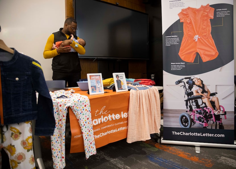 Kameron Brooks, working at The Charlotte Letter booth at the Low Incidents Disability...