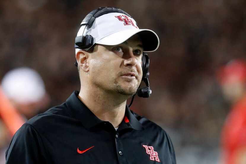 FILE - In this Sept. 15, 2016, file photo, Houston coach Tom Herman stands on the sideline...