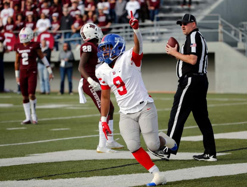 Duncanville running back Trysten Smith (9) celebrates his first touchdown against Lewisville...
