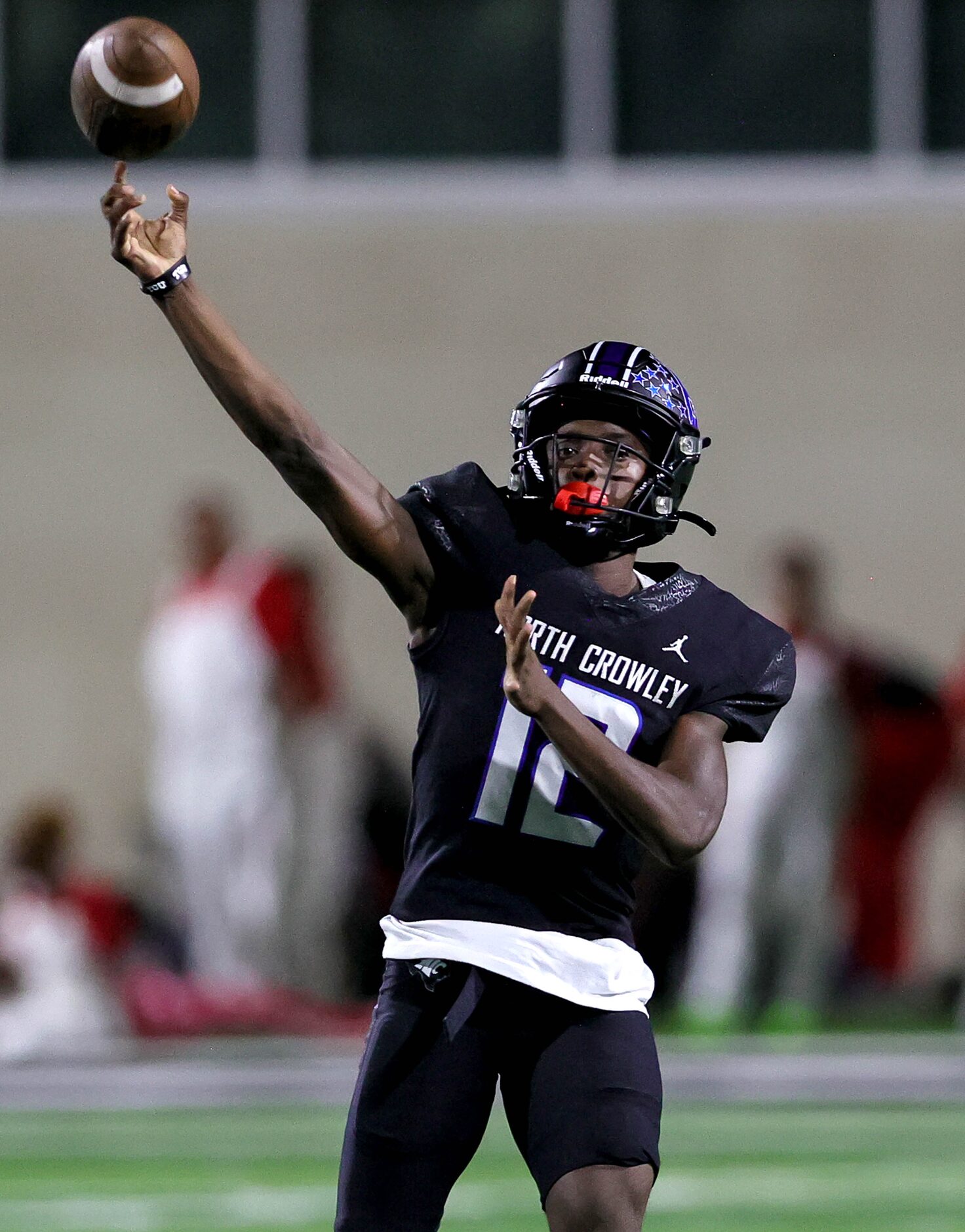 North Crowley quarterback Chris Jimerson Jr. throws a deep ball against Euless Trinity...