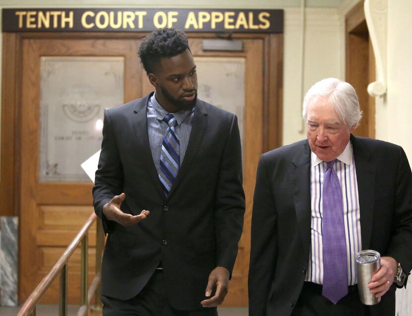 Sam Ukwuachu (left) appeared at the appeals court with his attorney, William Bratton III,...