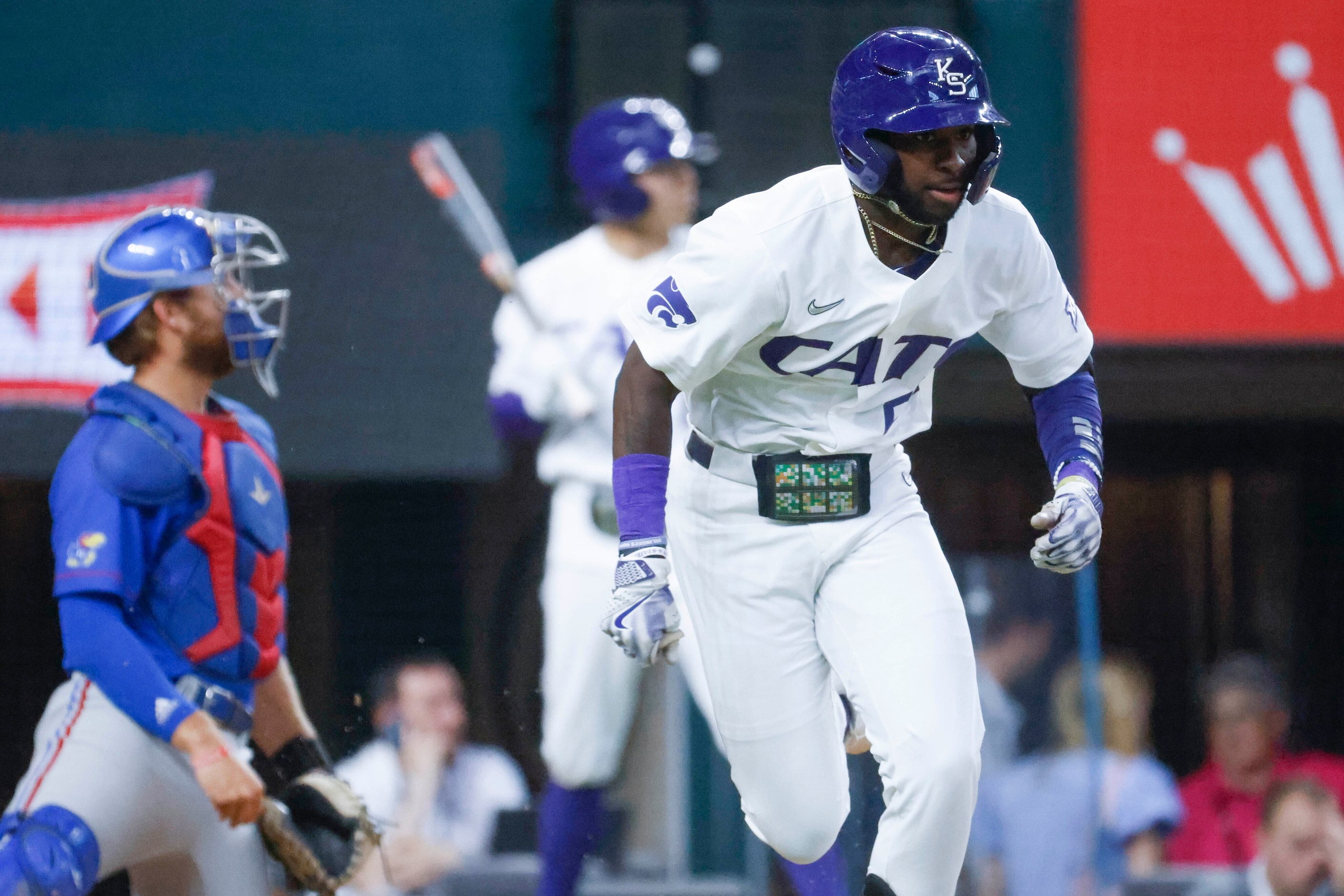 Kansas St. infielder Kaelen Culpepper runs after hitting a homer during the second inning of...