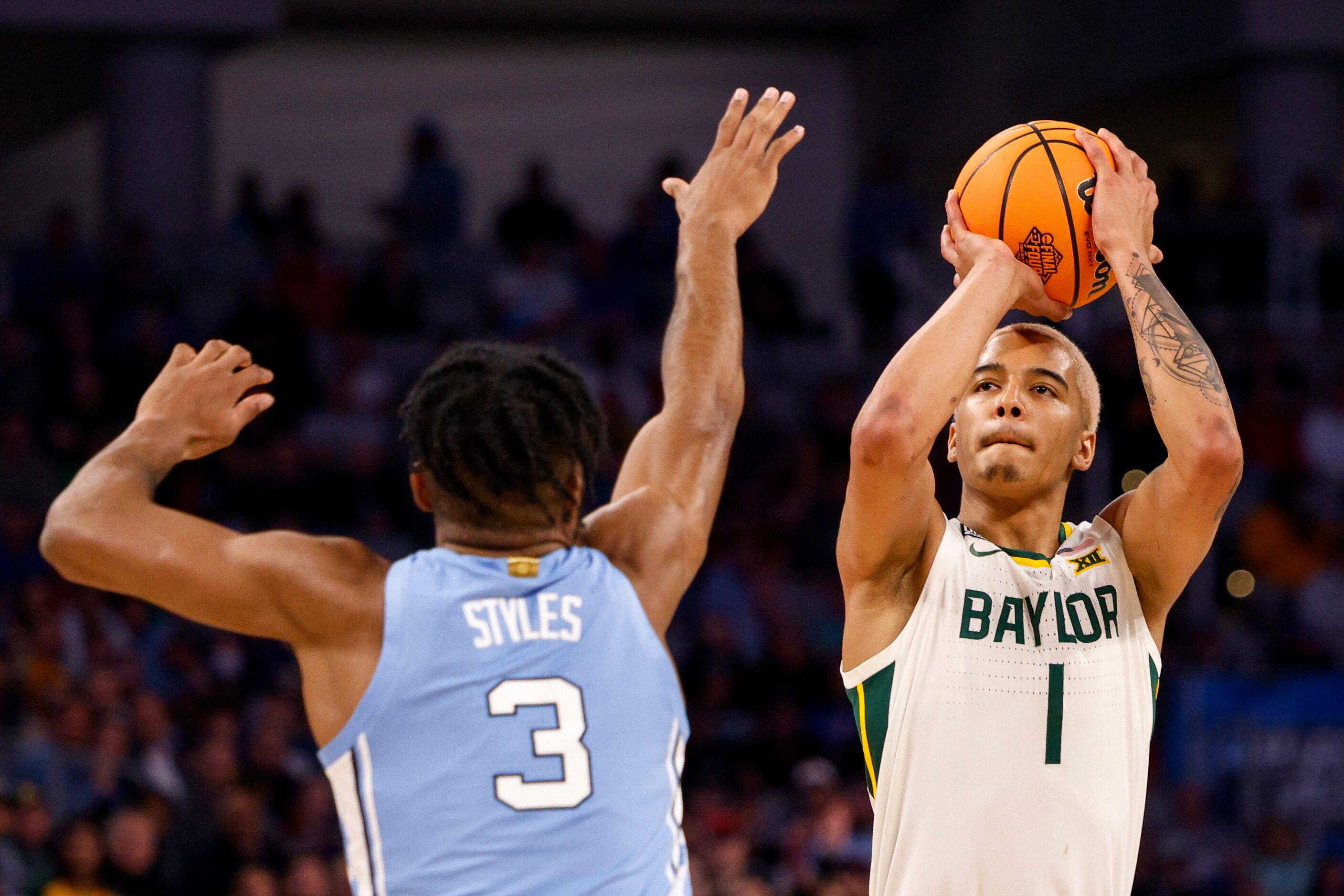 Baylor Bears forward Jeremy Sochan (1) shoots over North Carolina Tar Heels guard Dontrez...