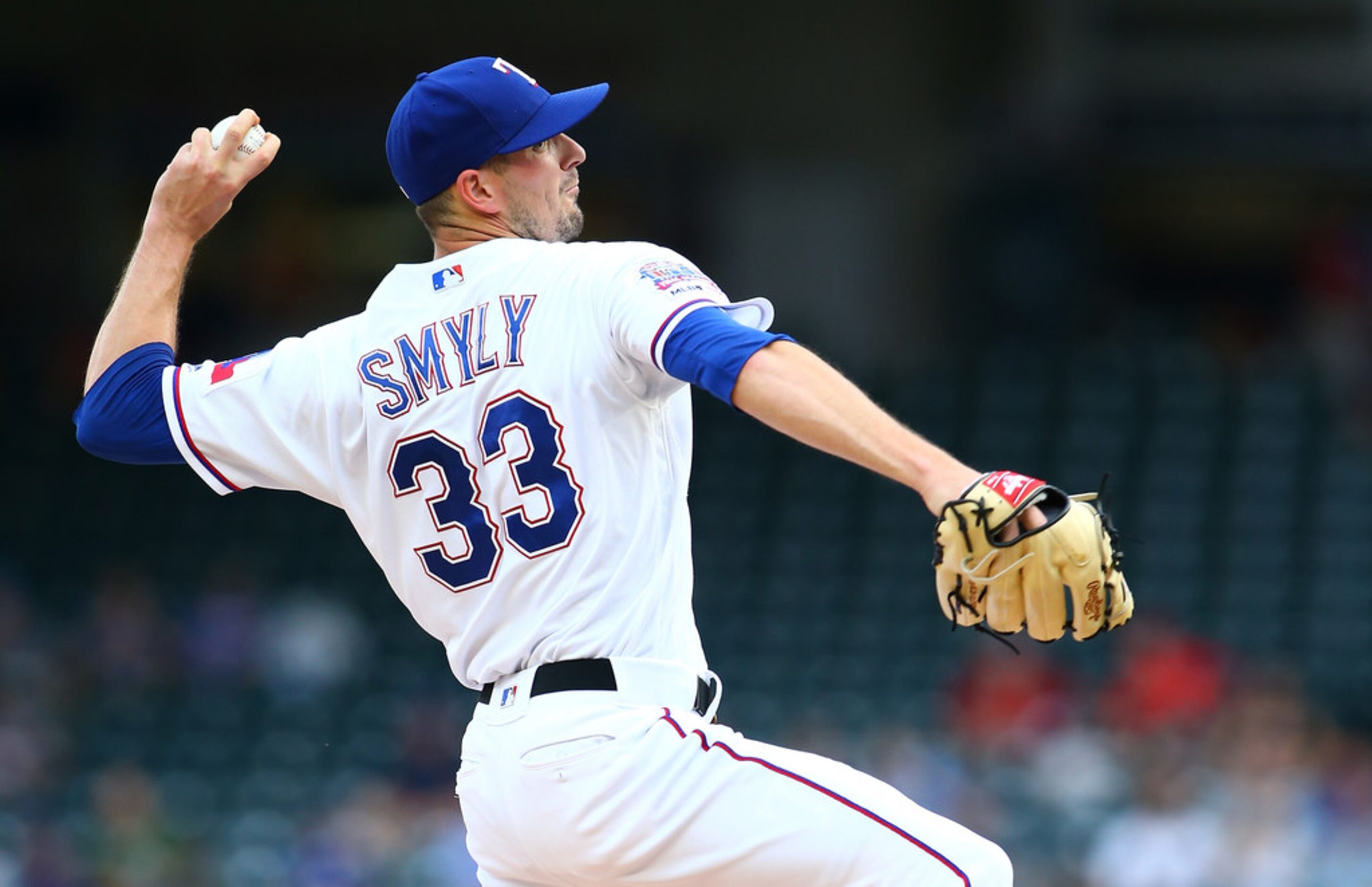 ARLINGTON, TX - JUNE 04: Drew Smyly #33 of the Texas Rangers throws in the first inning...