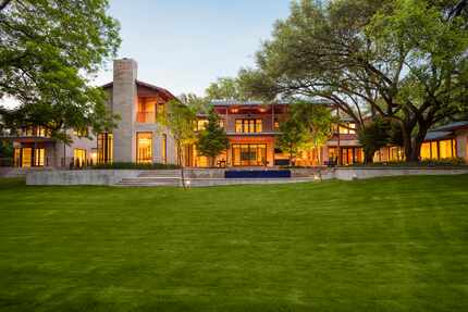  Warm and modern, the Sunnybrook home blends seamlessly with its natural surroundings....