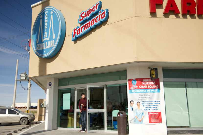 At a Farmacias Guadalajara, a Mexican pharmacy chain in Ciudad Juarez, employees have...