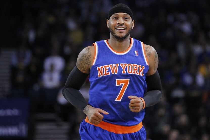 Mar 30, 2014; Oakland, CA, USA; New York Knicks forward Carmelo Anthony (7) smiles on the...