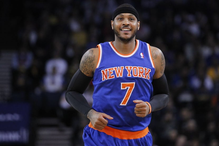 Mar 30, 2014; Oakland, CA, USA; New York Knicks forward Carmelo Anthony (7) smiles on the...