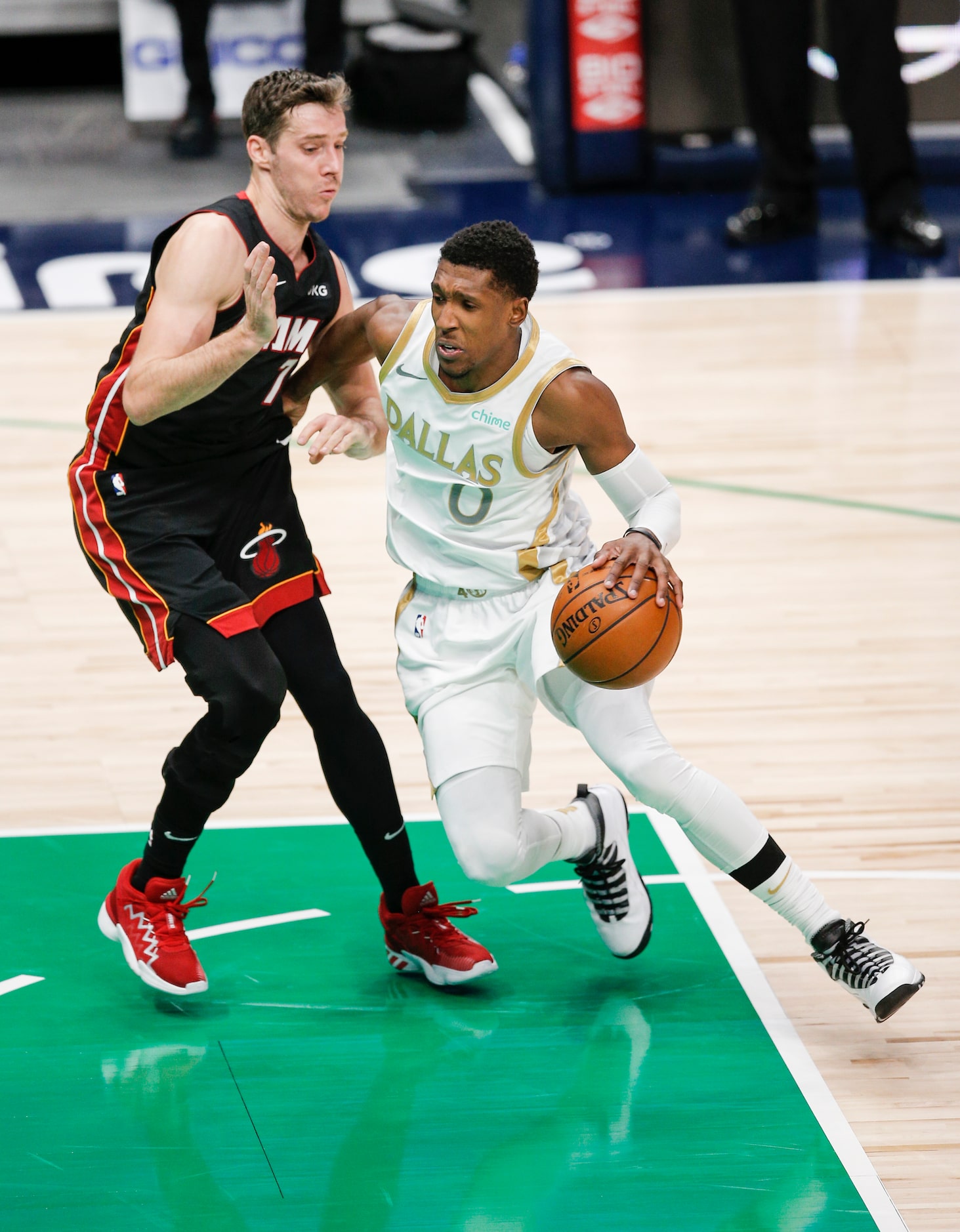 Dallas Mavericks guard Josh Richardson (0) battles Miami Heat guard Goran Dragic (7) for...