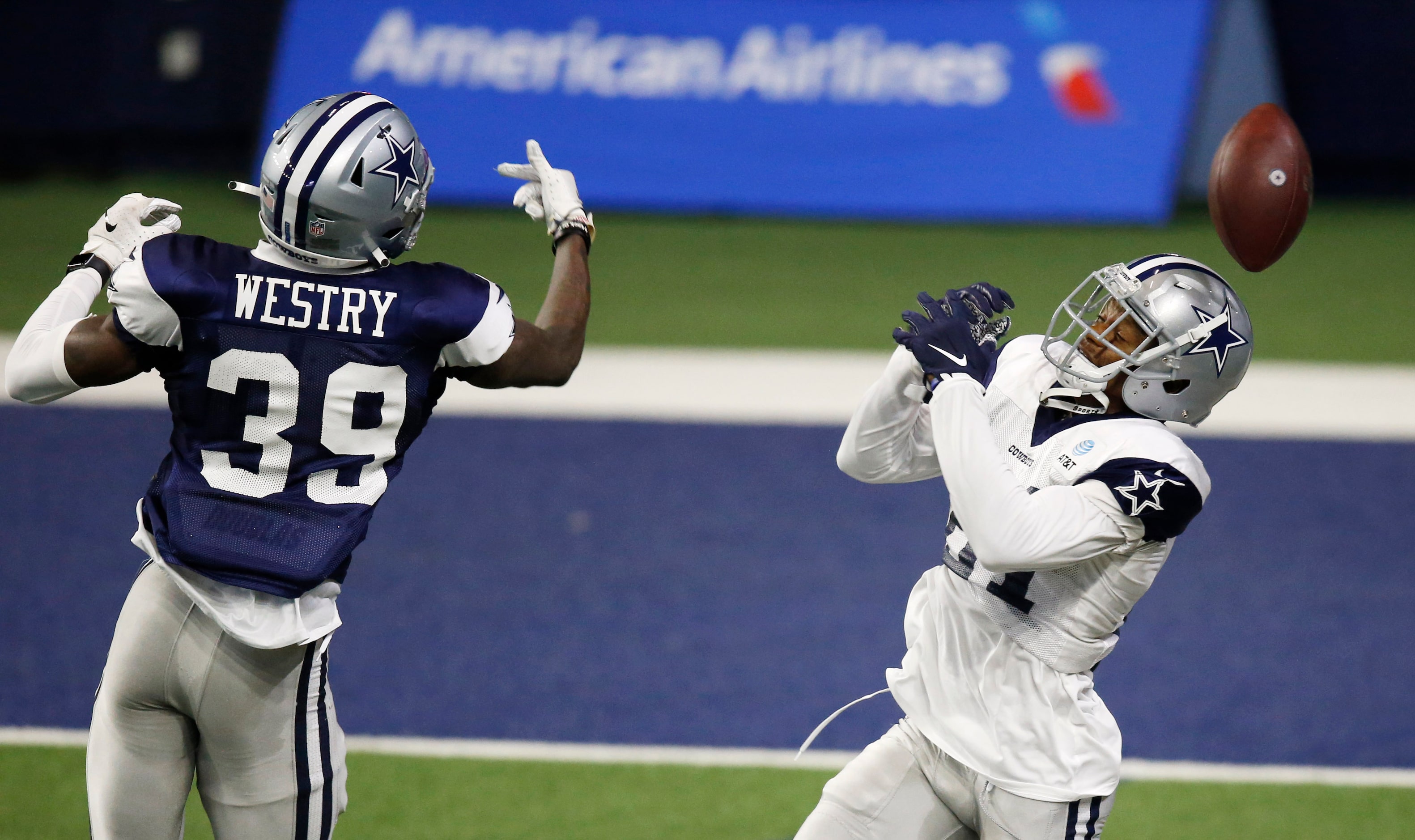 Dallas Cowboys wide receiver Jon'Vea Johnson (81) misses the catch as he is defended by...