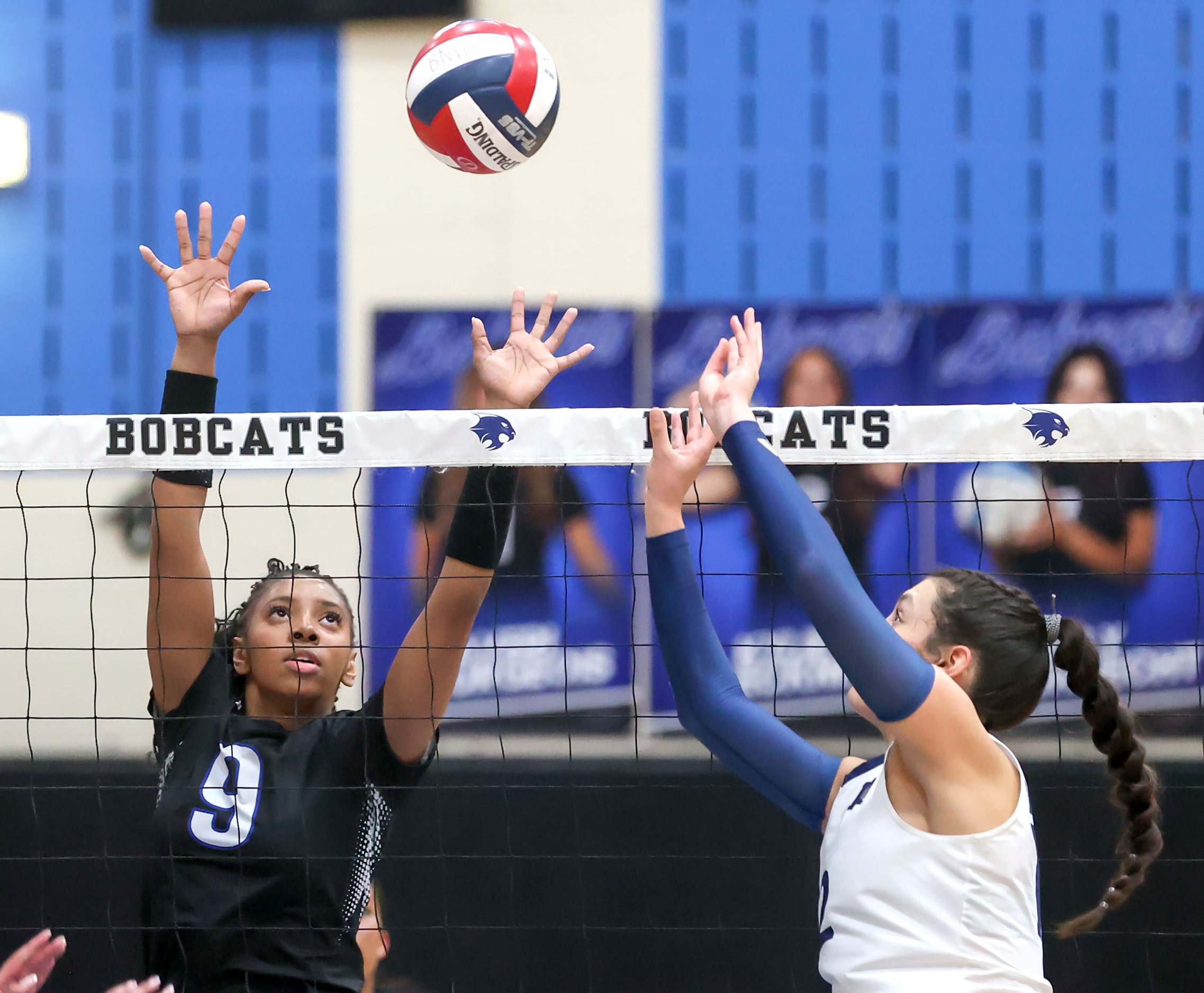 Byron Nelson's Zion Coats (9) tries to block a shot from Keller's Anna Flores (right) during...